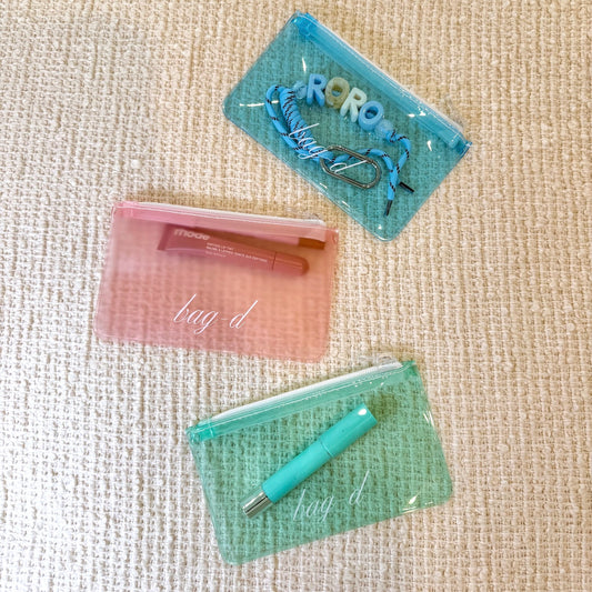BAG-D The Everything Pouch Pastel in frosted TPU — front view